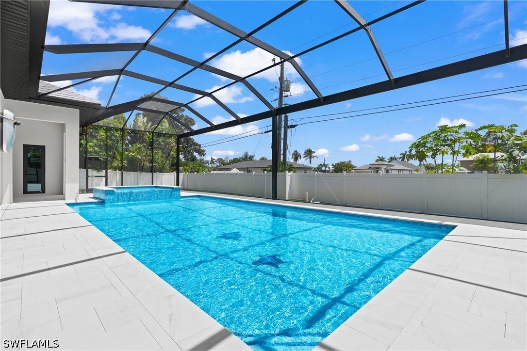 5 Bed Pool Home for Sale in Naples Park, photo 2