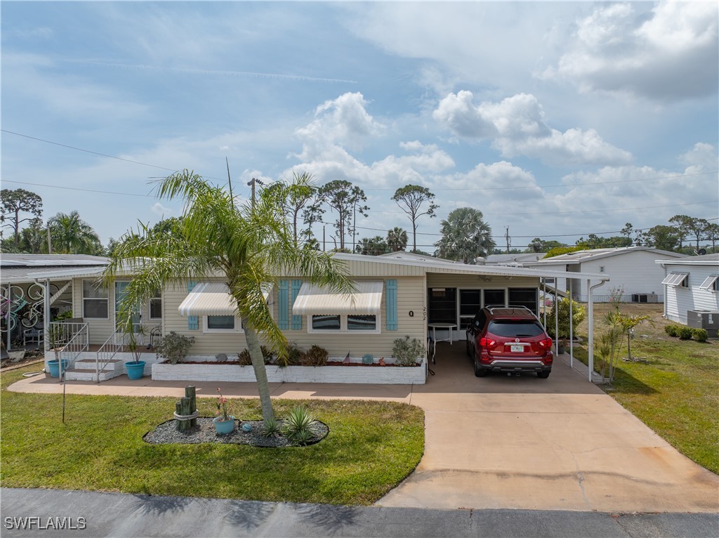 2 Bed ManufacturedHome for Sale in Carriage Village, FL — photo 2