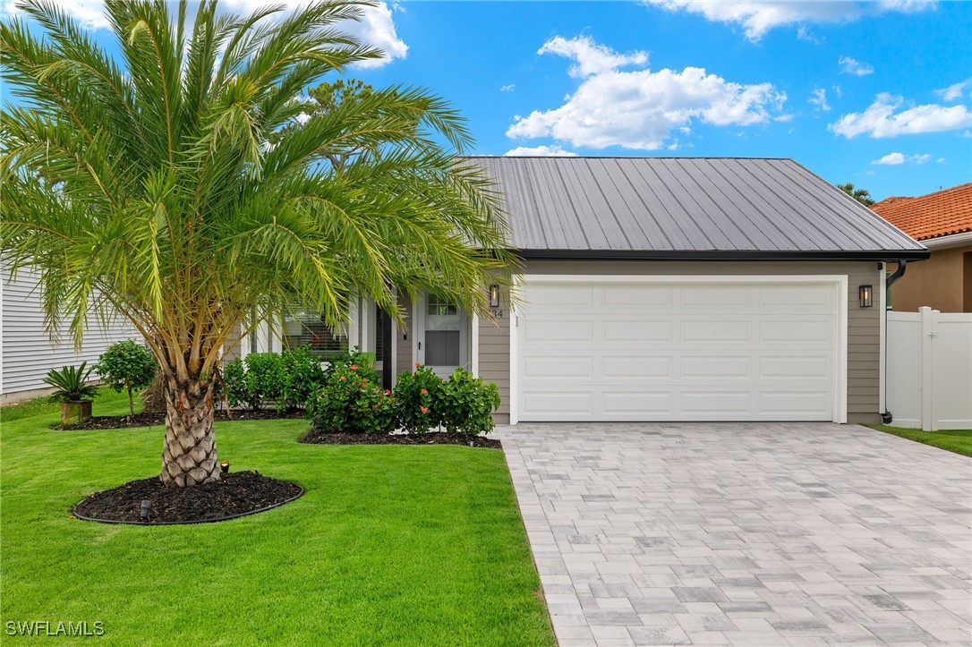 2 Bed Pool Home for Sale in Naples Park, FL, $899,000 — photo 2