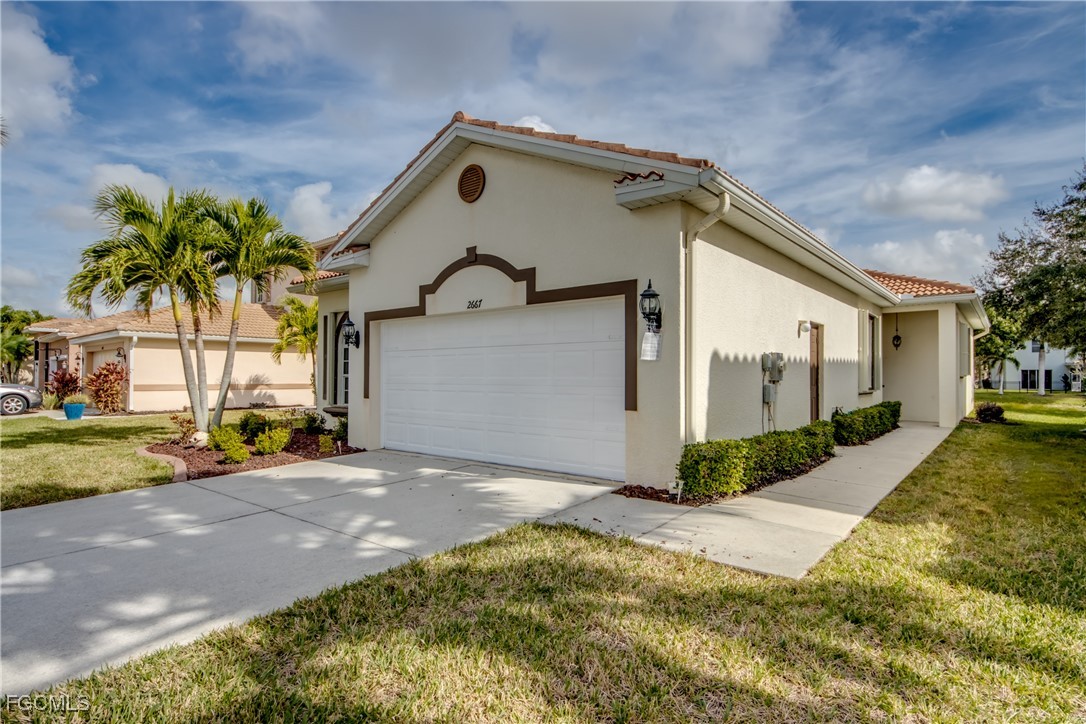 2 Bed Waterfront Home for Sale in Coral Lakes, FL, $249,900 — photo 2