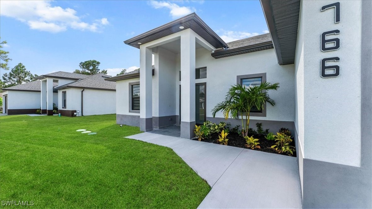 4 Bed SingleFamilyResidence for Sale in Lehigh Acres, FL — photo 2
