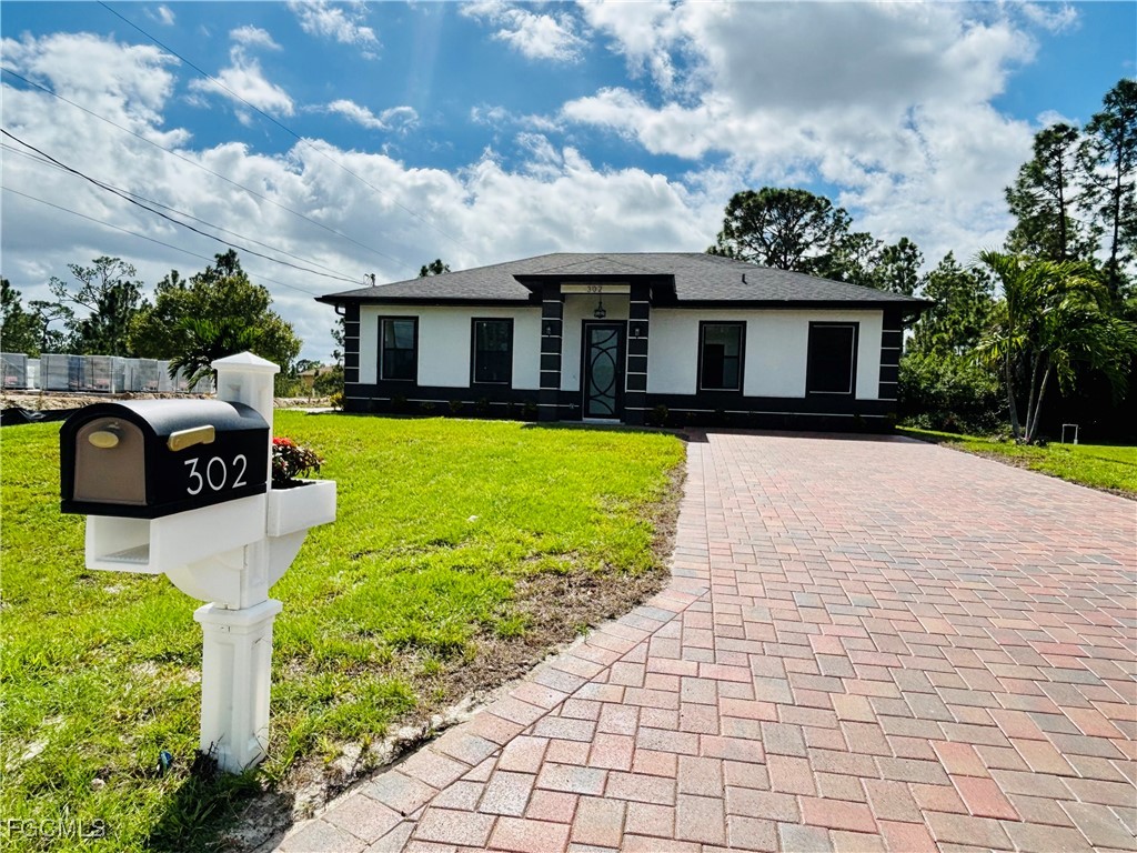 4 Bed SingleFamilyResidence for Sale in Lehigh Acres, FL — photo 2