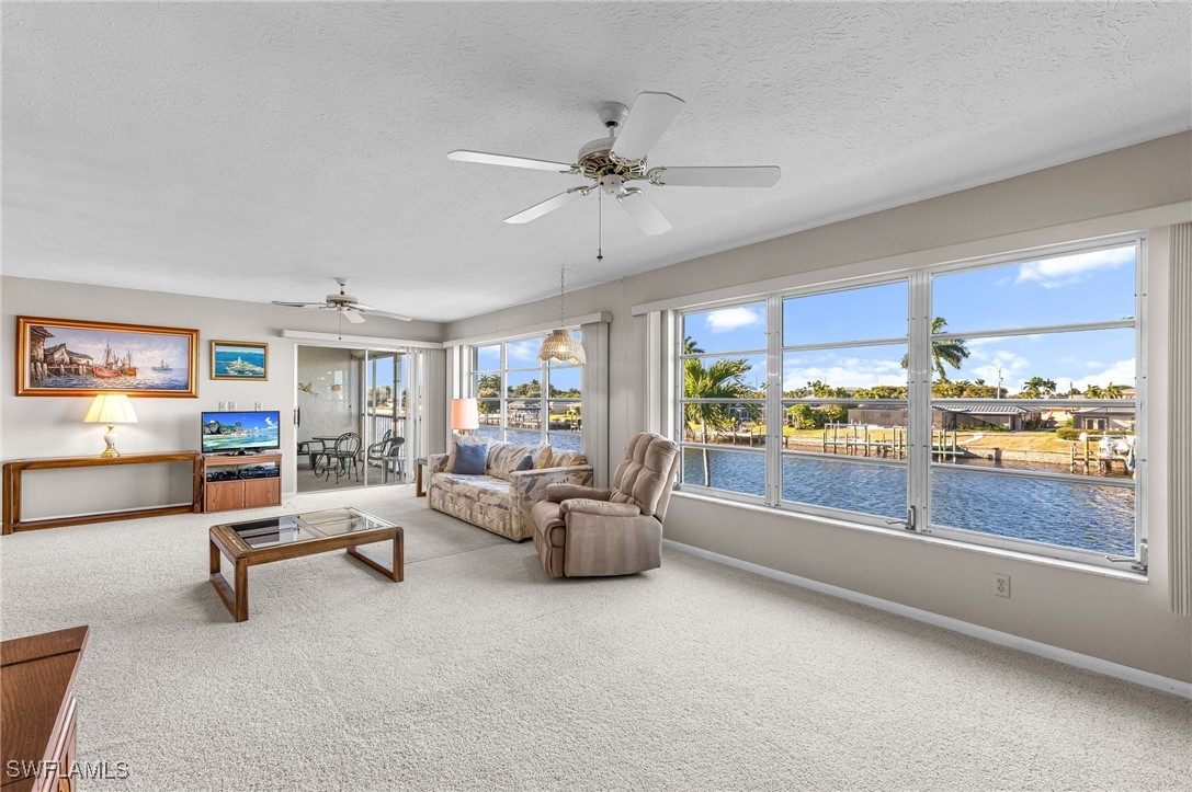 2 Bed Pool Home for Sale in Beach Villa Condo, FL, $209,900 — photo 2