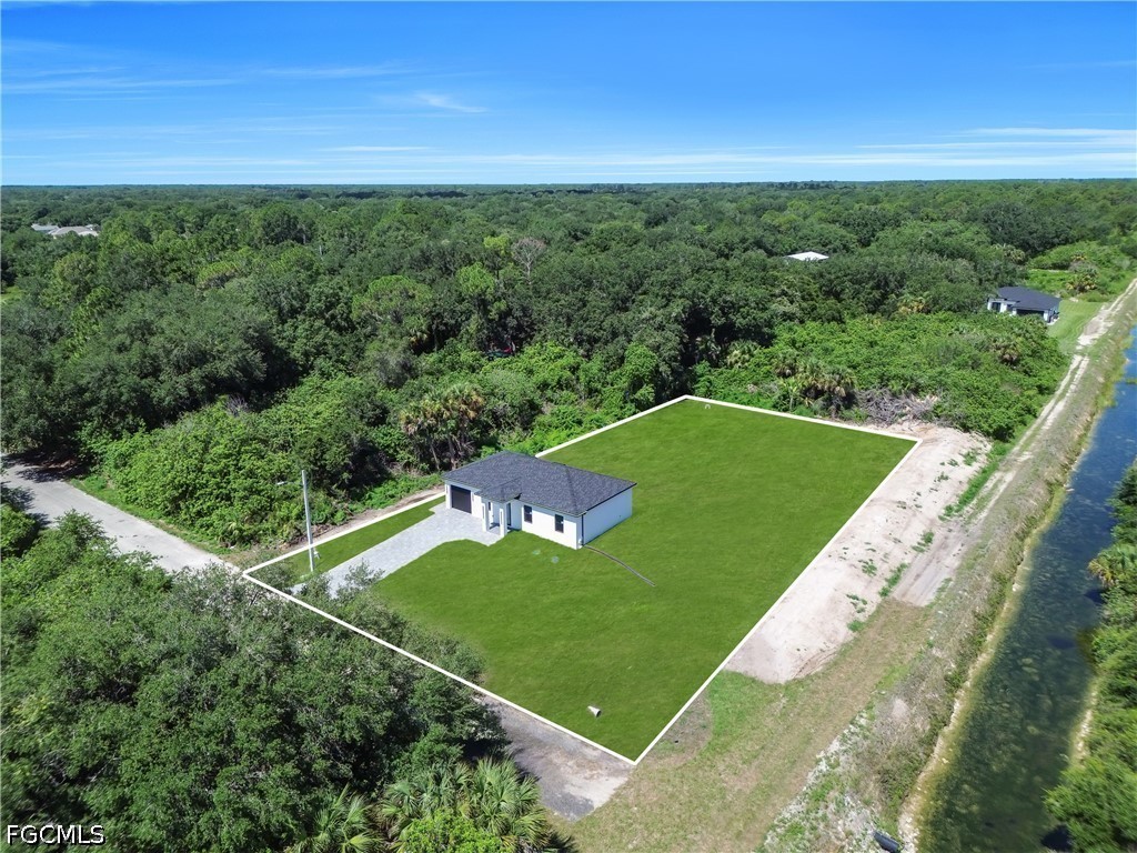 3 Bed Waterfront Home for Sale in Lehigh Acres, FL, $289,900 — photo 2