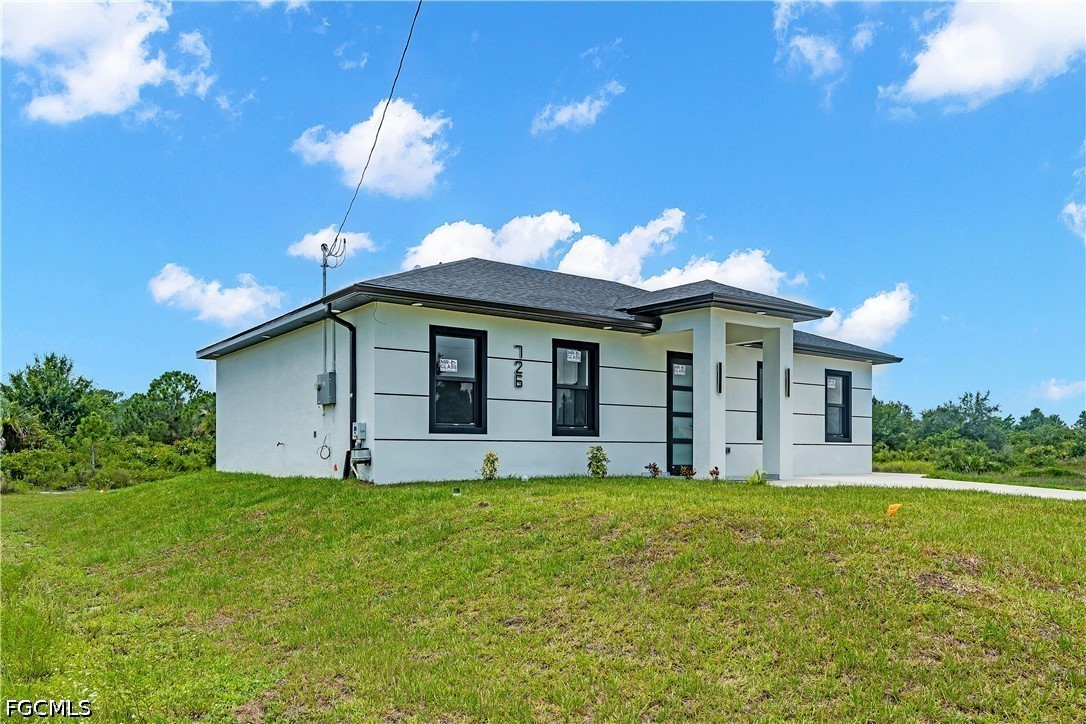 4 Bed SingleFamilyResidence for Sale in Lehigh Acres, FL — photo 2