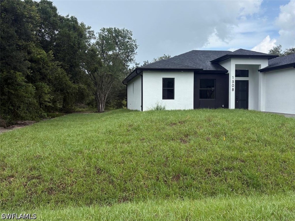 4 Bed SingleFamilyResidence for Sale in Lehigh Acres, FL — photo 2