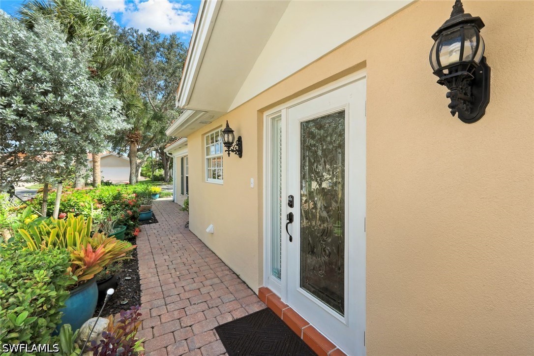 2 Bed Waterfront Home for Sale in Island Walk, FL, $539,000 — photo 2