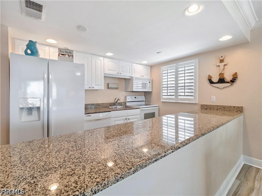 2 Bed Pool Home for Sale in Beach Villas Condo, photo 19