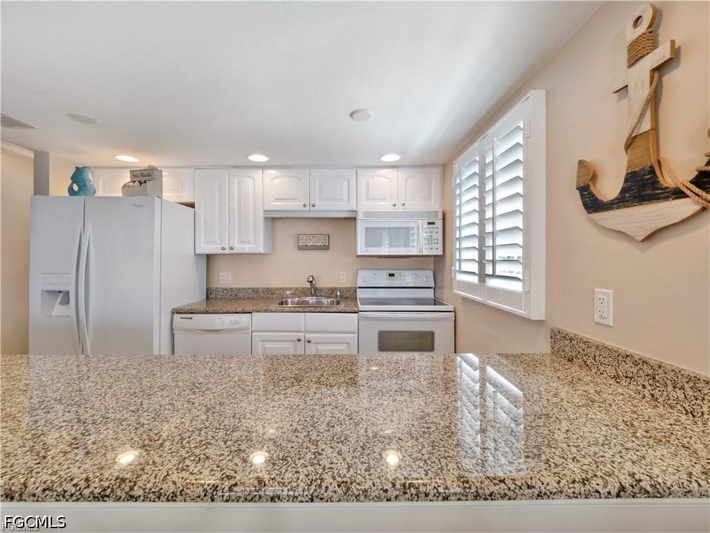 2 Bed Pool Home for Sale in Beach Villas Condo, photo 21
