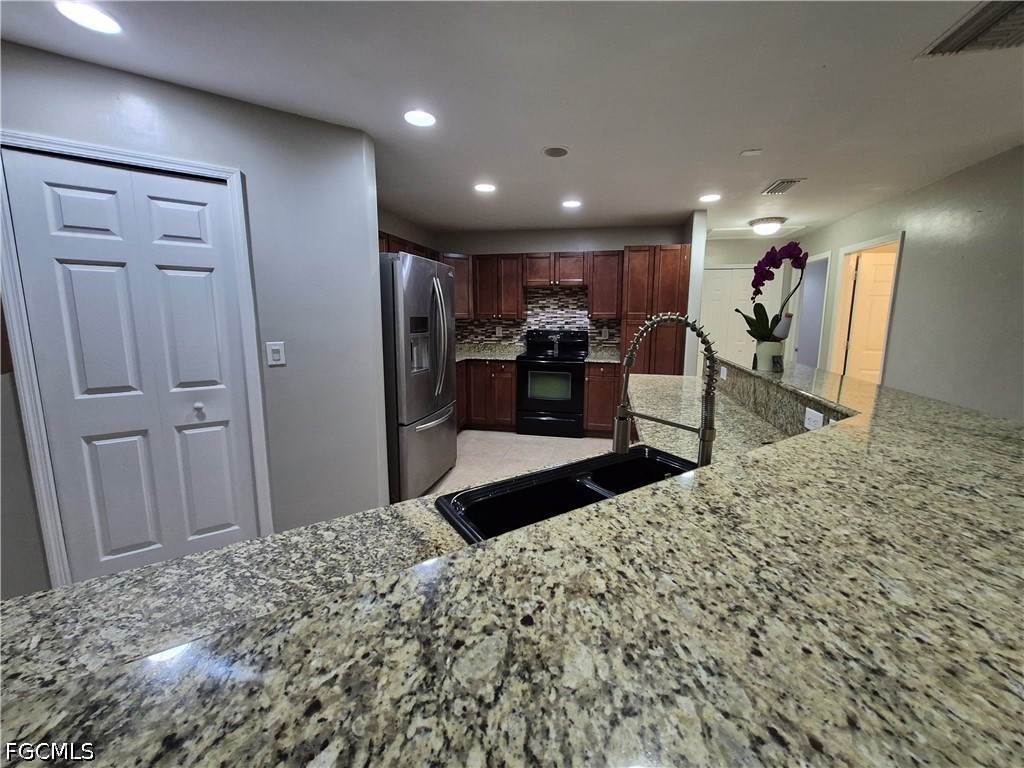 4 Bed Waterfront Home for Sale in Lehigh Acres, FL, $388,000 — photo 25