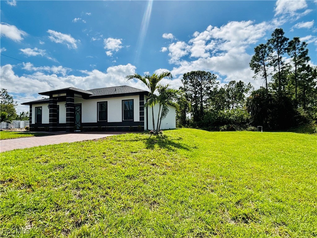 4 Bed SingleFamilyResidence for Sale in Lehigh Acres, FL — photo 4