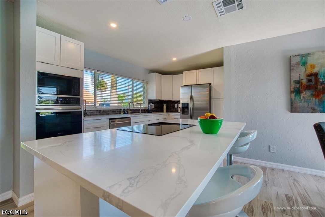 4 Bed Pool Home for Sale in Cape Coral, FL, $599,000 — photo 4