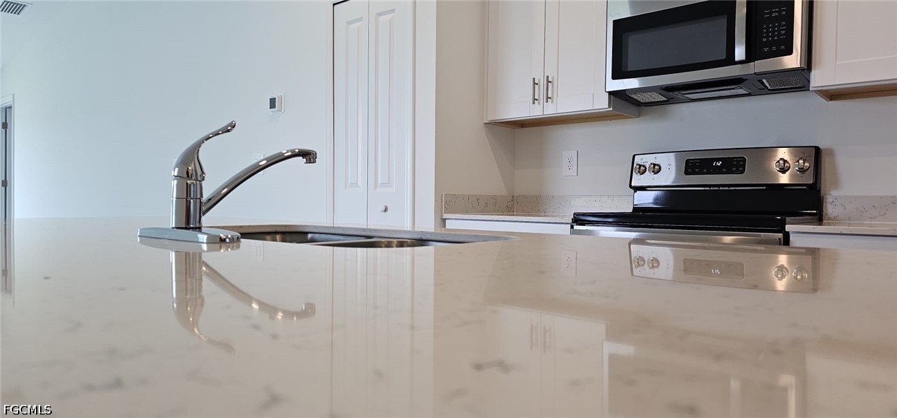 3 Bed Waterfront Home for Sale in Lehigh Acres, photo 4