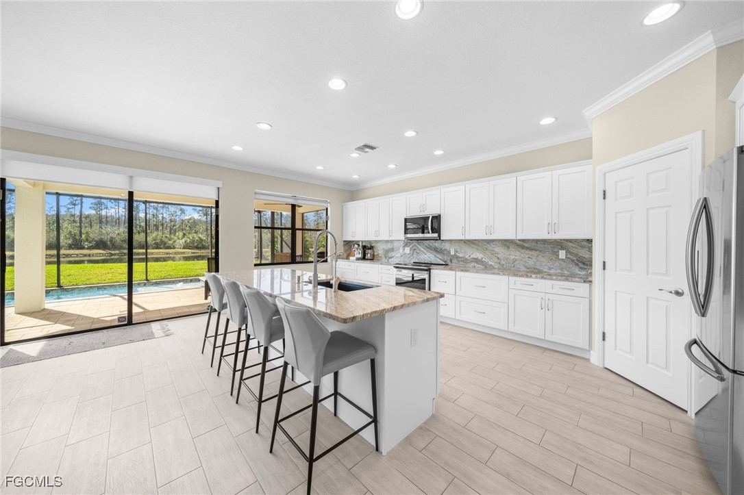 4 Bed Pool Home for Sale in Reflection Isles, photo 6