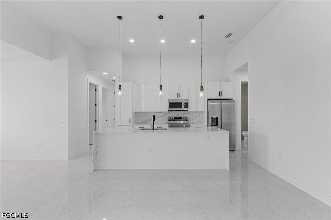 4 Bed Pool Home for Sale in Pelican Bay Woods, photo 6