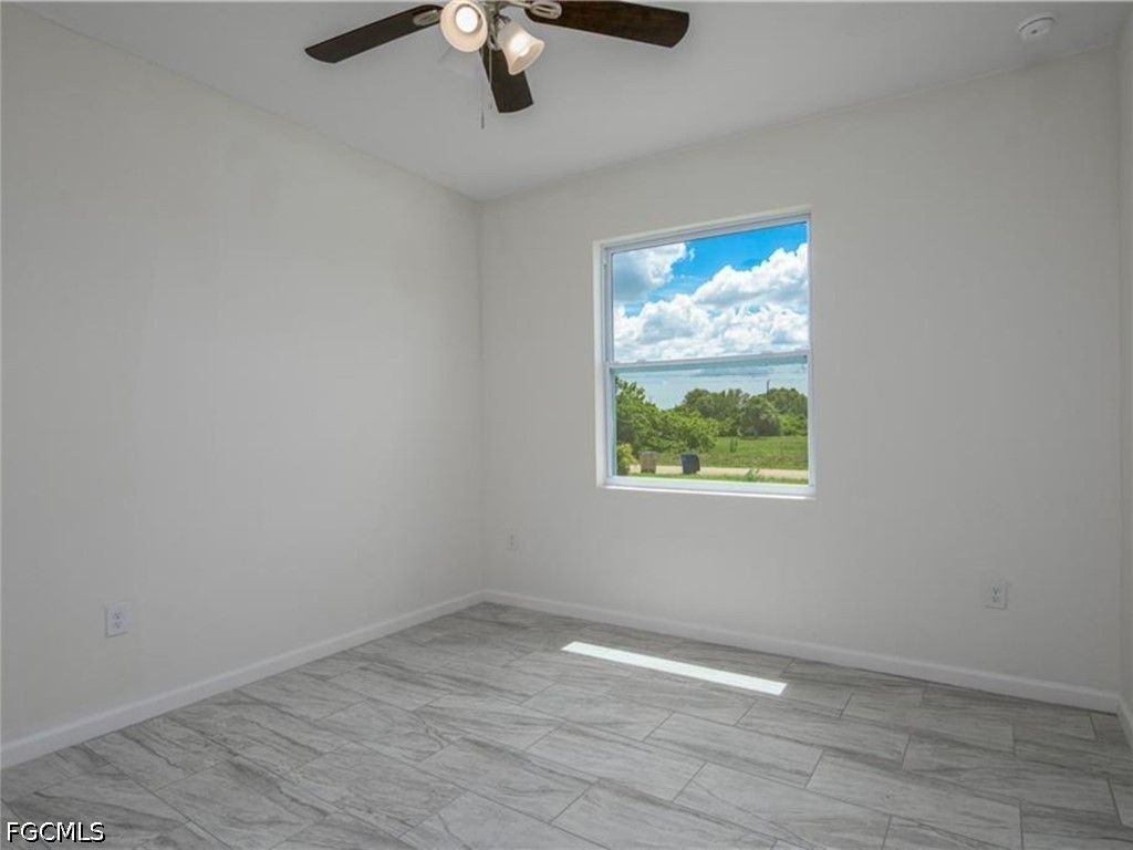 4 Bed SingleFamilyResidence for Sale in Lehigh Acres, FL — photo 7
