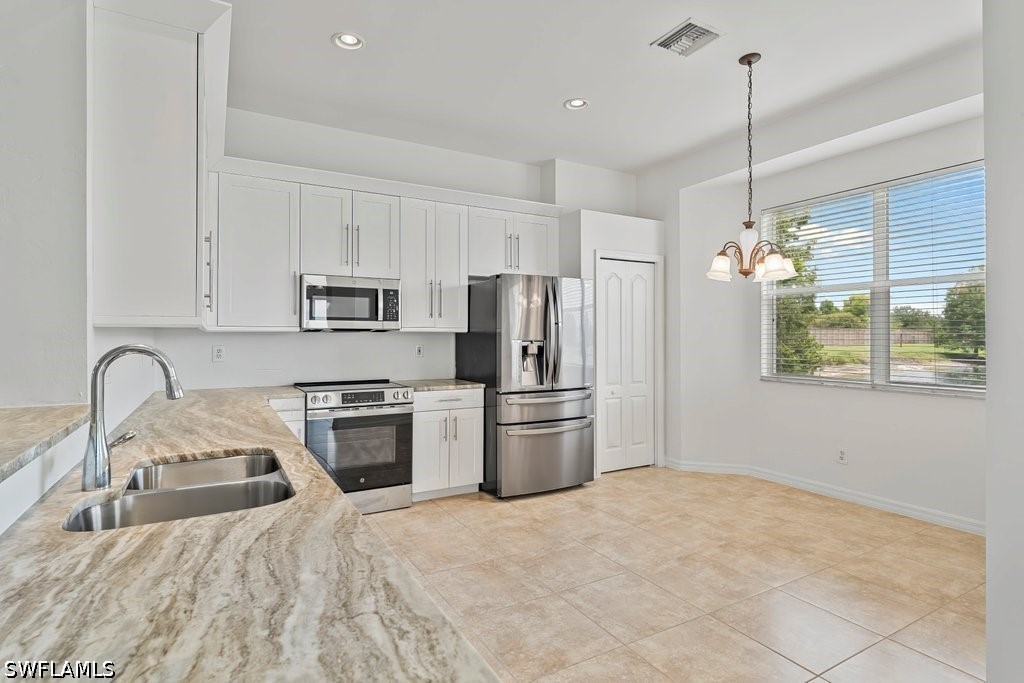 4 Bed Waterfront Home for Sale in Stoneybrook, FL, $599,900 — photo 8