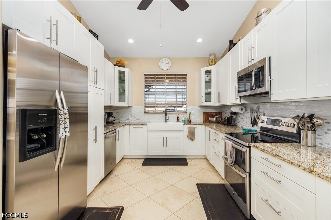 4 Bed SingleFamilyResidence for Sale in Mirror Lakes, FL — photo 9