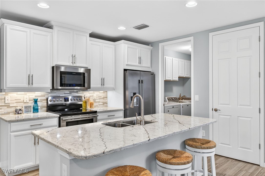 2 Bed Waterfront Home for Sale in Coral Harbor, FL, $515,000 — photo 10